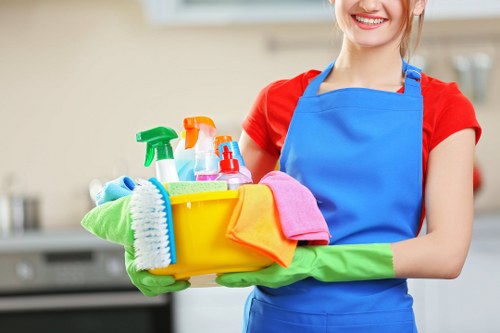 Cleaning professional using safety equipment during an end of tenancy clean