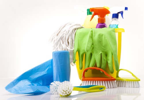 Charity donation bags and sorted recyclables from a tenancy clean