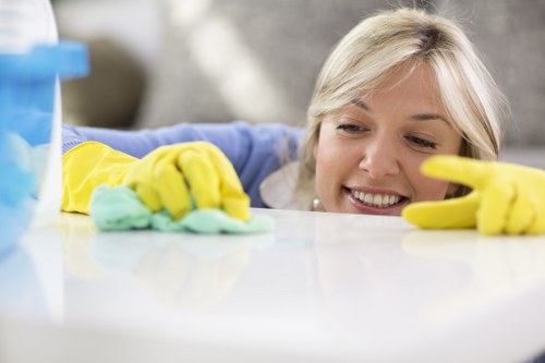 End of tenancy oven cleaner working in a residential property kitchen